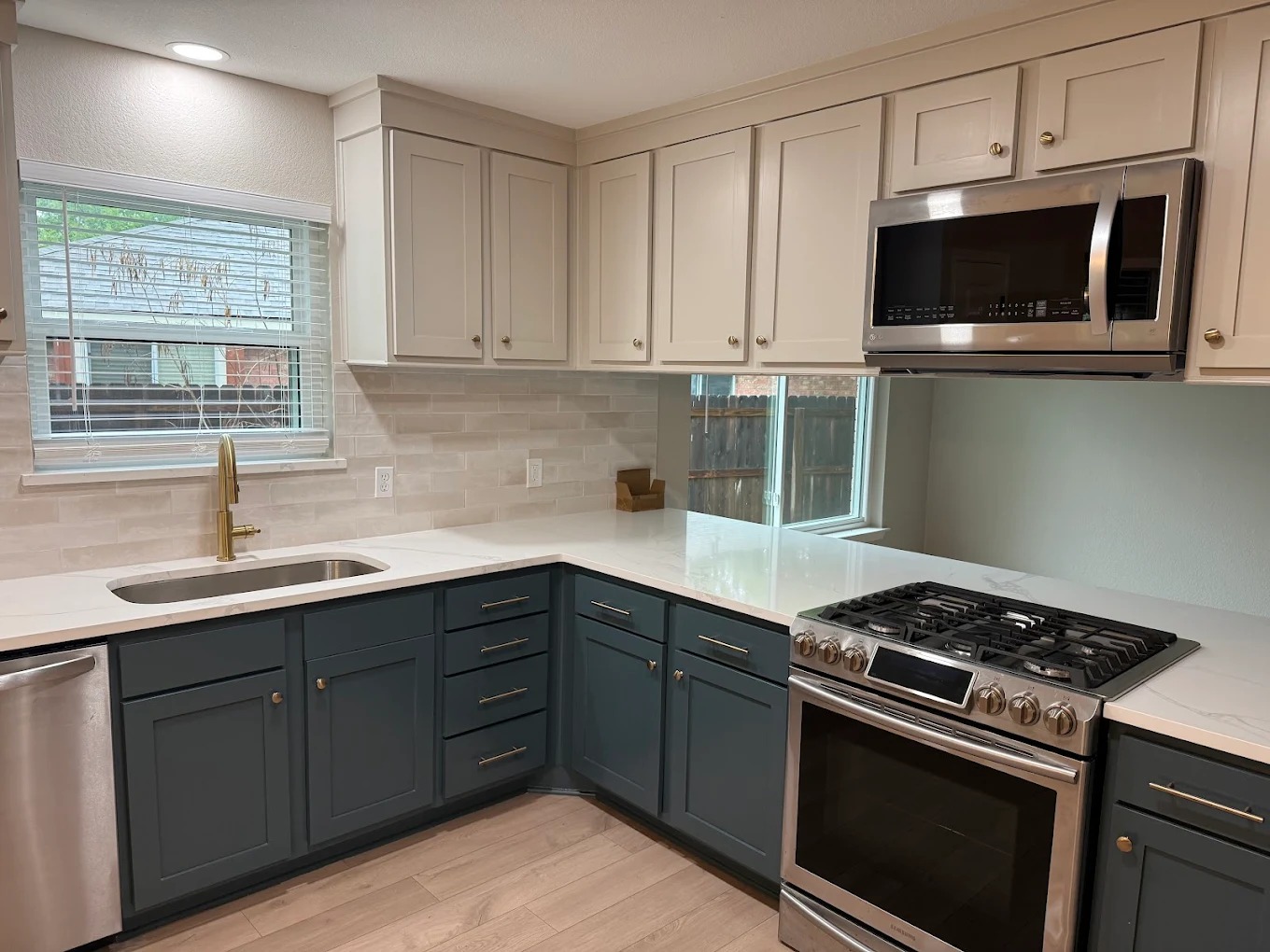 Stunning two tone kitchen deep cleaned by Splash Maids in Toronto