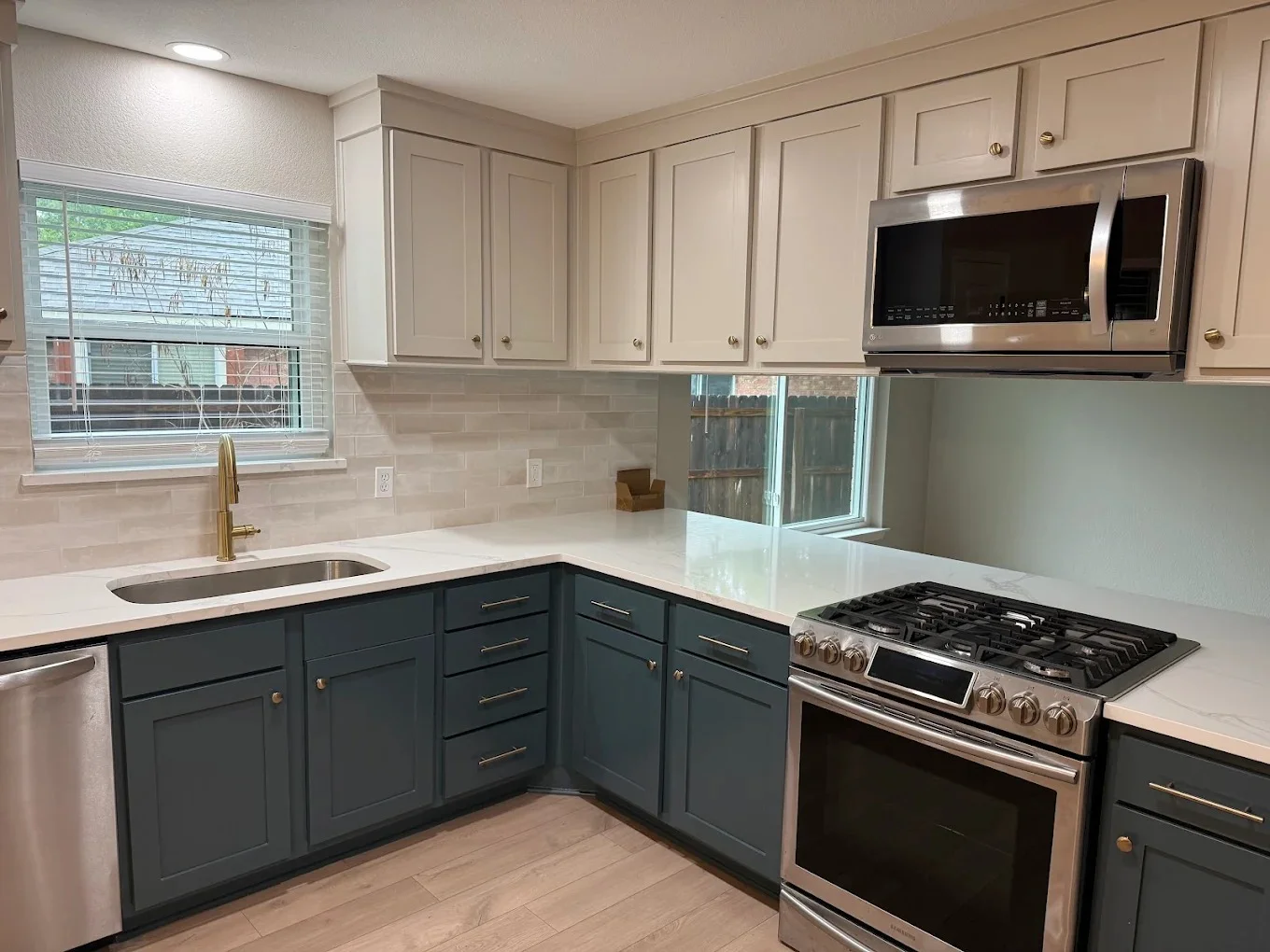 Stunning two tone kitchen deep cleaned by Splash Maids in Toronto