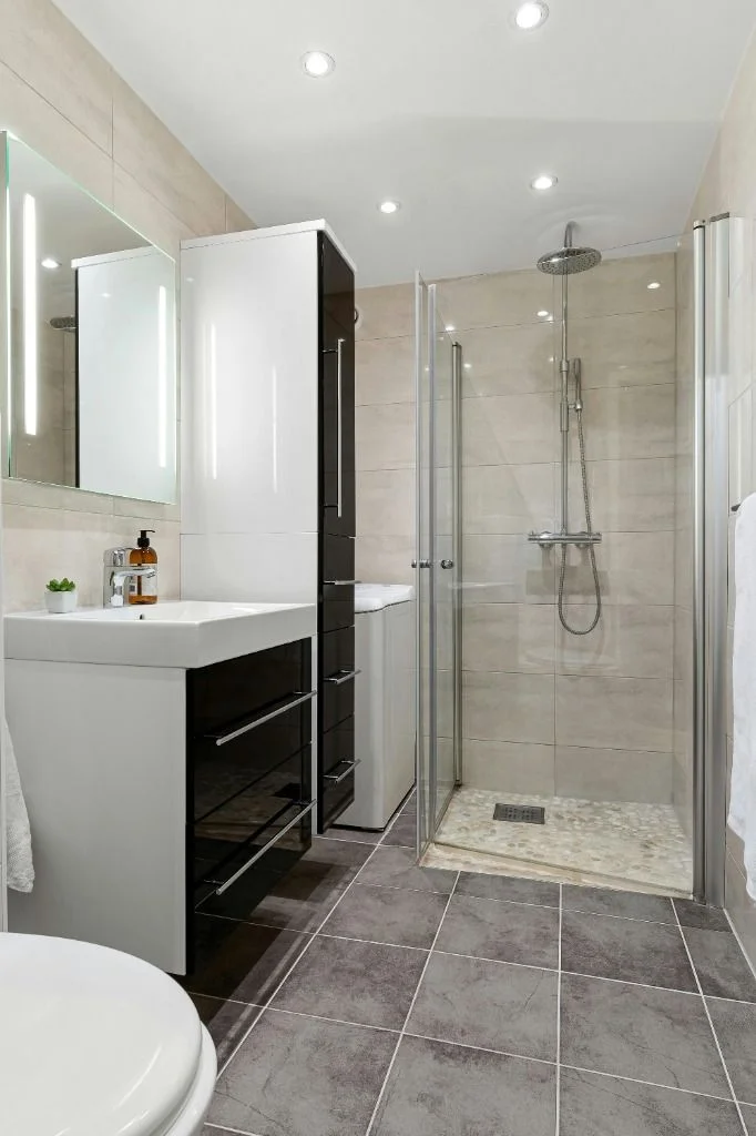 Pristine modern bathroom with glass shower deep cleaned by Splash Maids in Toronto