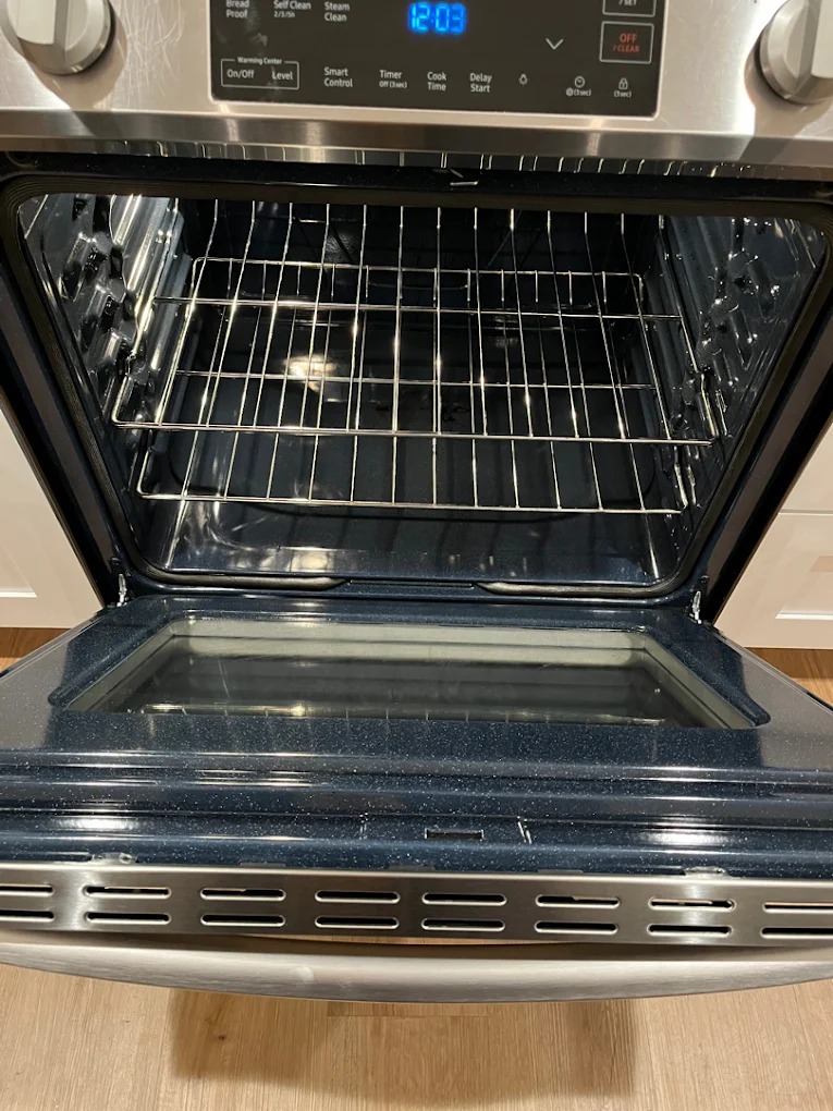 Polished stainless oven racks interior after deep cleaning